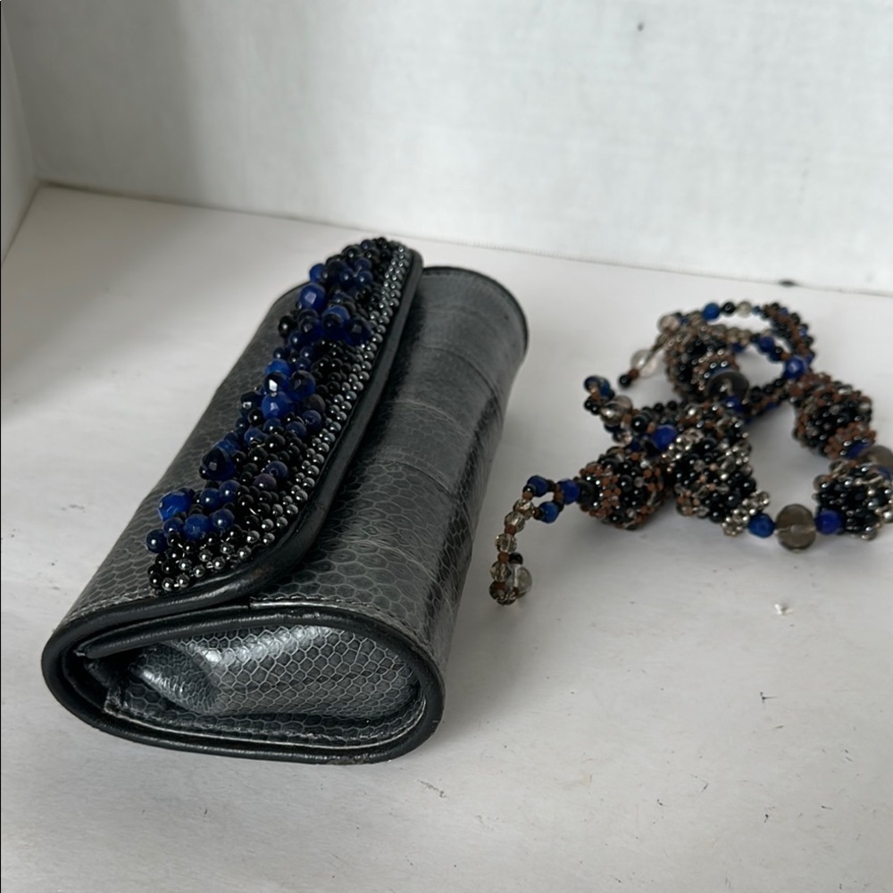 Elegant Grey snake Clutch with Beaded Detail
